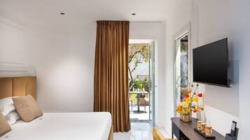 Luksusleilighet, hageutsikt | Sengetøy av topp kvalitet, dundyner og memory foam-senger