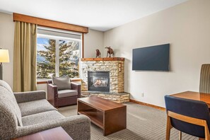 TV, fireplace - 1BR Rocky Mountain Hideaway w/ Hot Tubs, Gym & BBQ (Canmore)