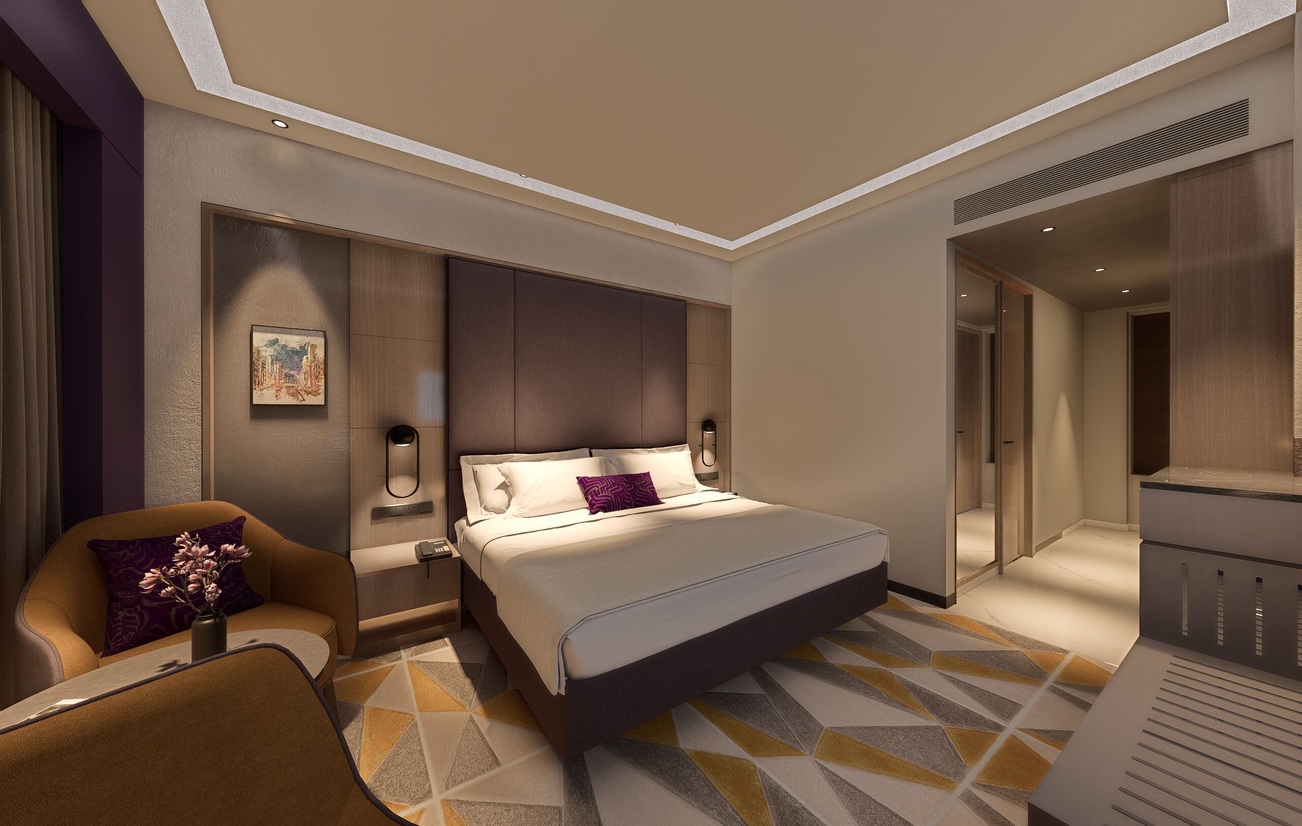 Ein modernes Hotelzimmer mit einem großen Bett, einer Sitzecke mit Sessel und kleinem Tisch sowie einem Schreibtisch mit Stuhl.