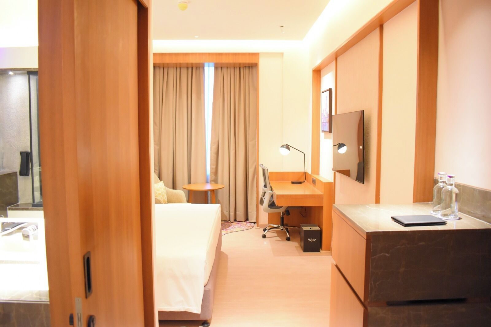 Premium bedding, minibar, desk, laptop workspace