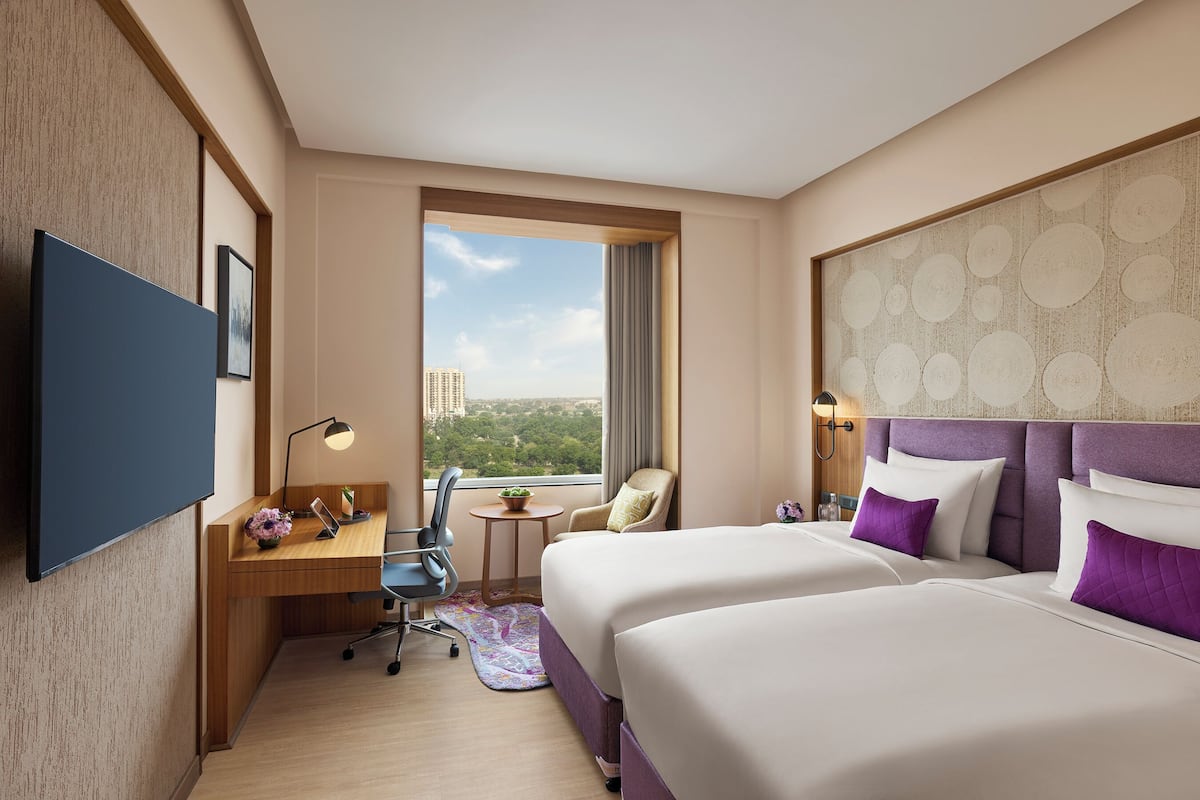 Chambre Deluxe avec lits jumeaux | Literie de qualité, minibar, bureau