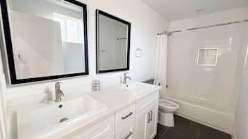 Hair dryer, towels, soap, toilet paper