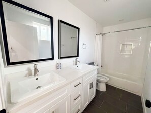 Hair dryer, towels, soap, toilet paper