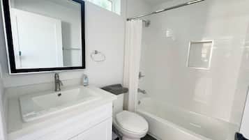 Hair dryer, towels, soap, toilet paper