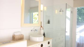 Shower, hair dryer, towels, soap
