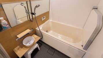Eco-friendly toiletries, hair dryer, bidet, towels