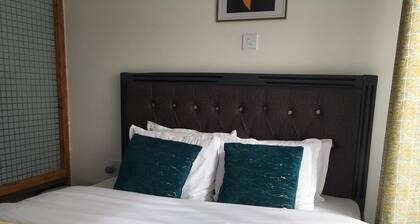 Elegant 1-Bedroom Apartment with Complimentary Pool
