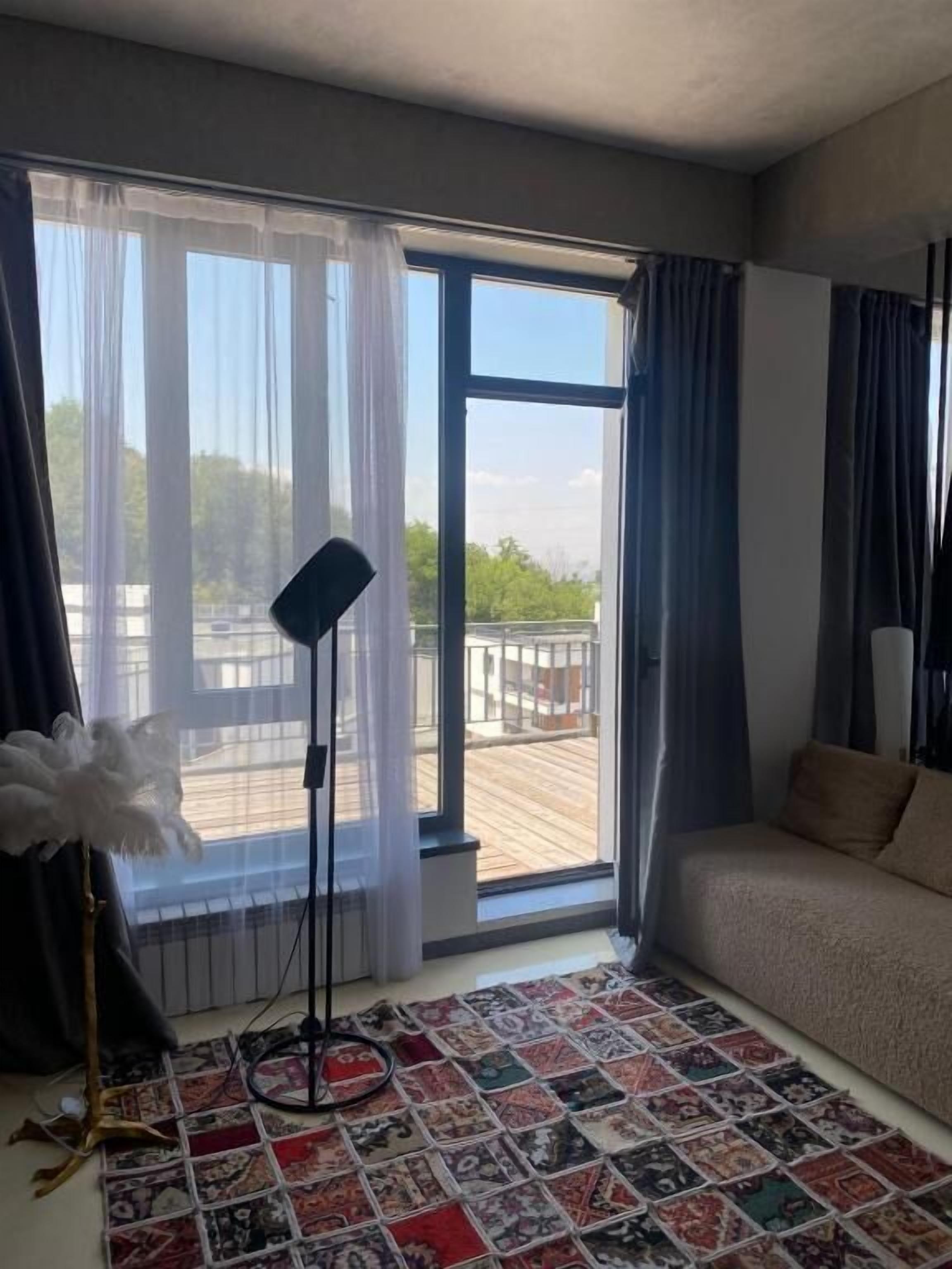 Suite junior, balcón | Zona de estar