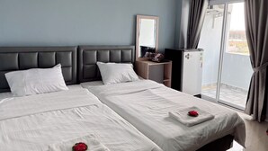 FamilieTwin kamer, uitzicht op tuin | Gratis wifi