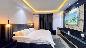 Economy Apartment, Balcony, City View | Desk, laptop workspace, blackout curtains, soundproofing