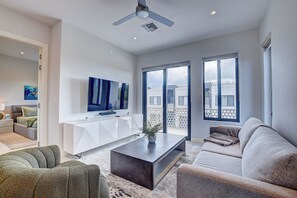Living area - Modern condo in gated community. Steps to beach. (Nassau)