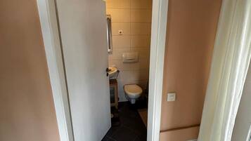 Chuveiro, secador de cabelo