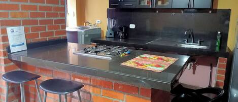 Fridge, microwave, coffee/tea maker, toaster