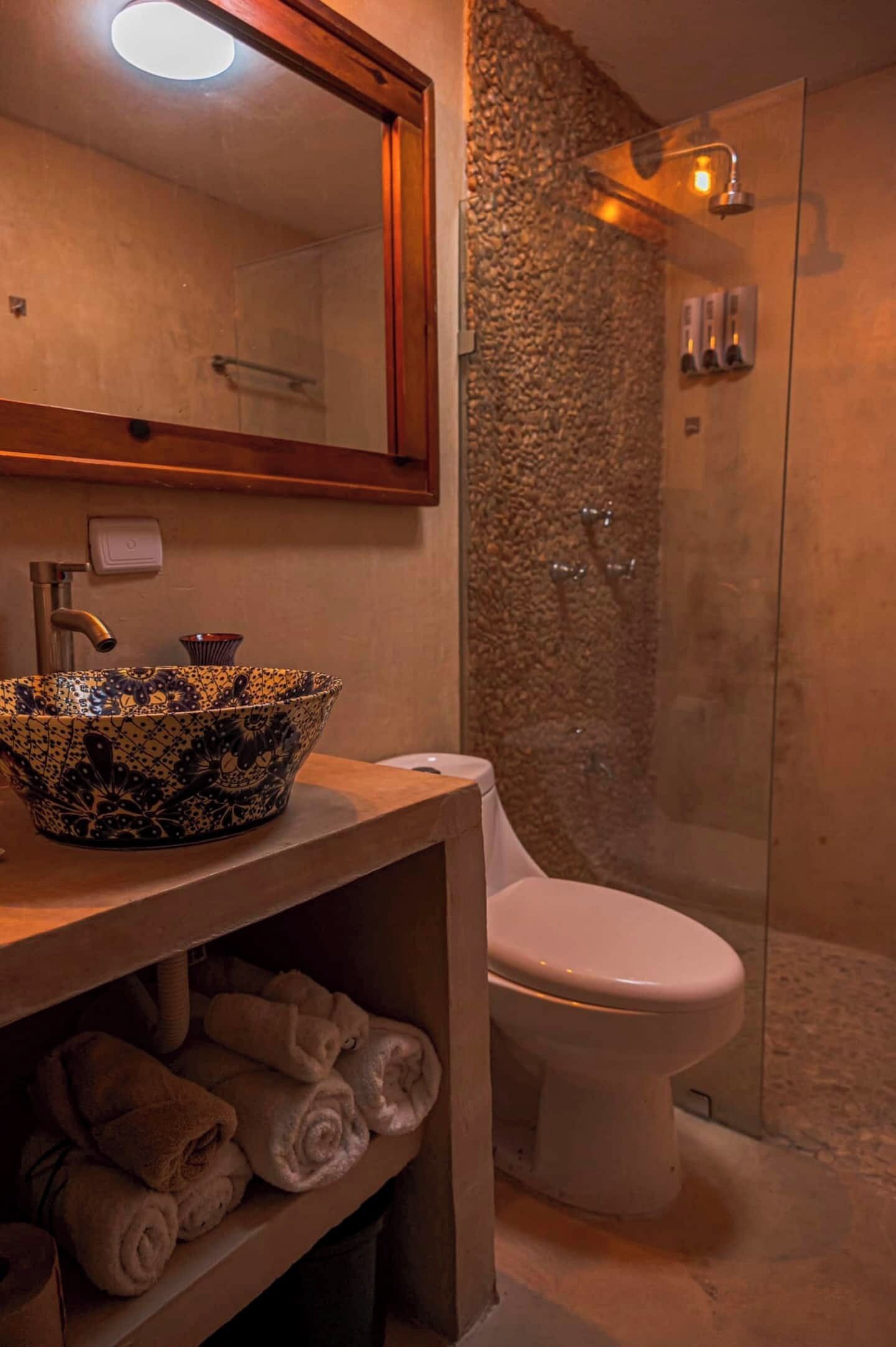 Shower, towels, soap, toilet paper