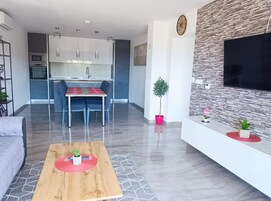 Apartment (Three Bedroom Apartment with Balcony ) | Living room | 32-inch flat-screen TV with satellite channels