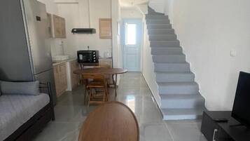 Deluxe Apartment, Balcony, Partial Sea View | Living area