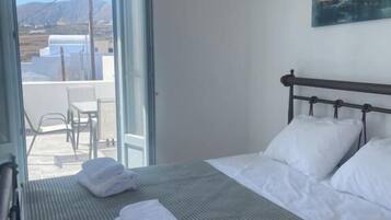 Deluxe Apartment, Balcony, Partial Sea View | In-room safe, soundproofing, iron/ironing board, free WiFi