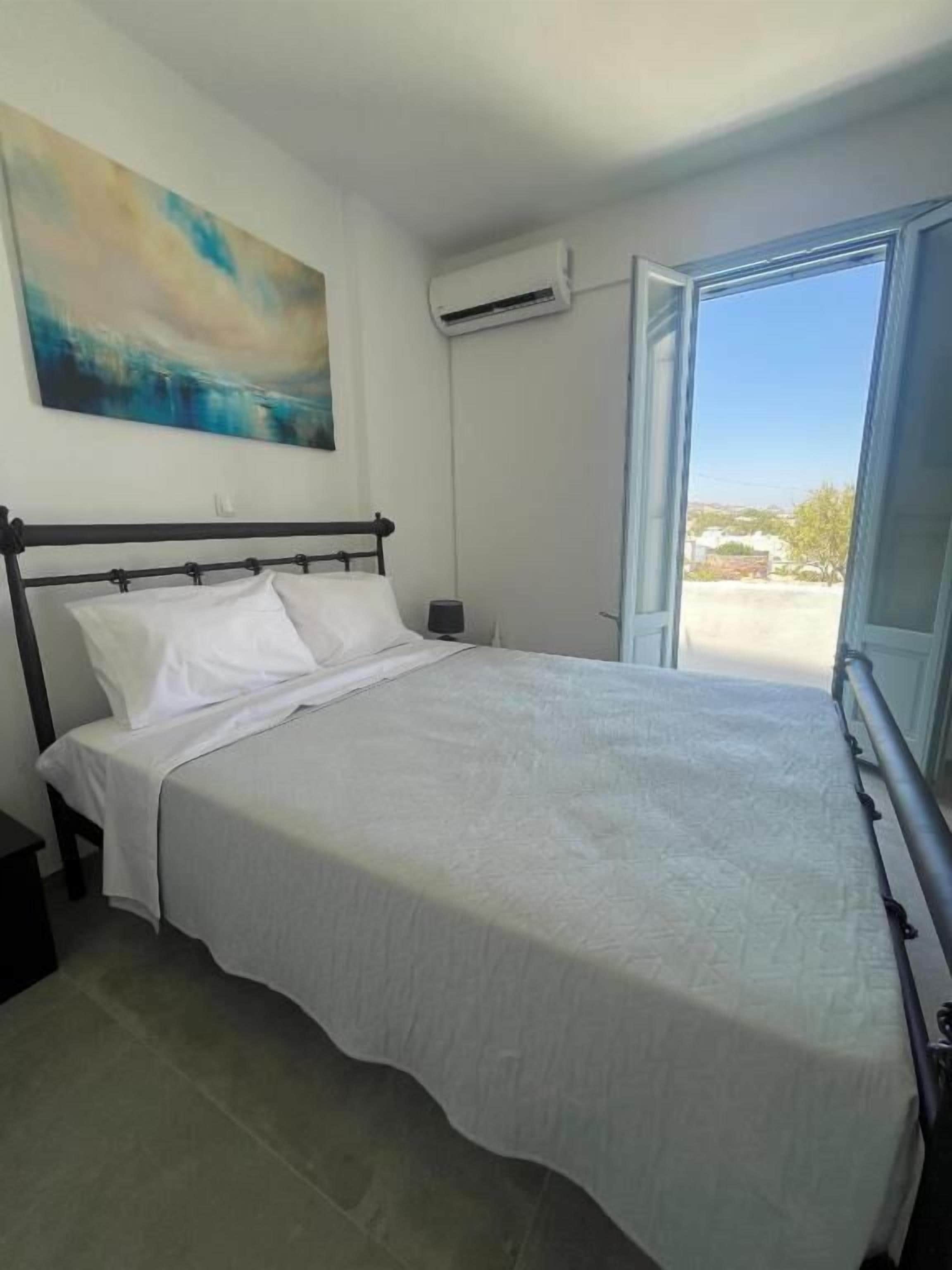 Standard Apartment, Balcony, City View | In-room safe, soundproofing, iron/ironing board, free WiFi
