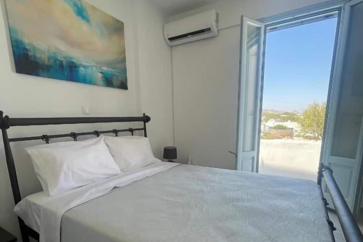 Standard Apartment, Balcony, City View | In-room safe, soundproofing, iron/ironing board, free WiFi