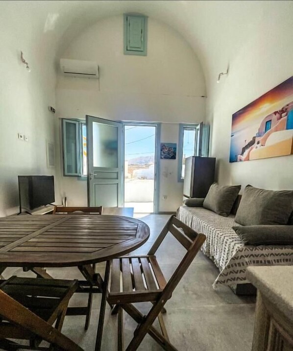 Standard Apartment, Balcony, City View | Living area | TV - Aliki's apartments (Vothonas)