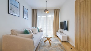 Apartment (406) | Living area | Flat-screen TV - Apartamenty Sun & Snow The One Ustronie Morskie (Sianożęty)