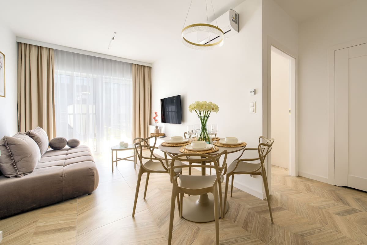 Apartamento (409) | Zona de estar | Una televisión de pantalla plana