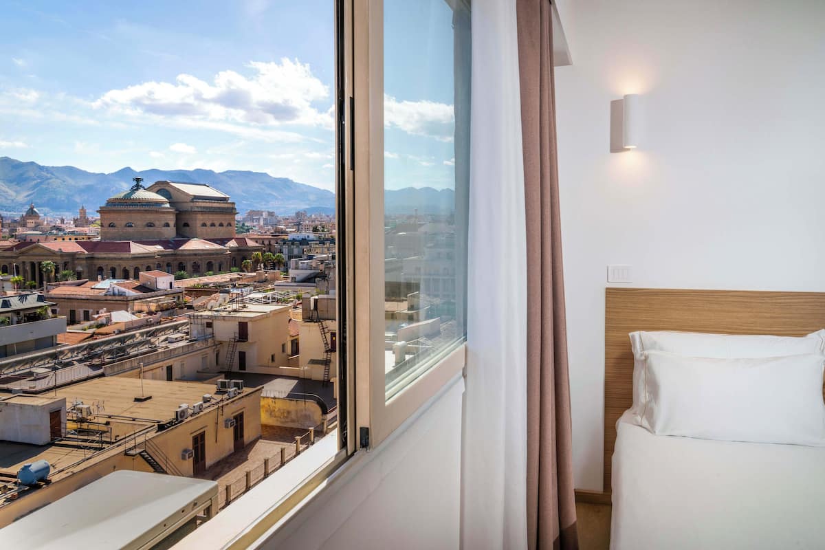 Deluxe Triple Room, City View | Premium bedding, desk, laptop workspace, free WiFi