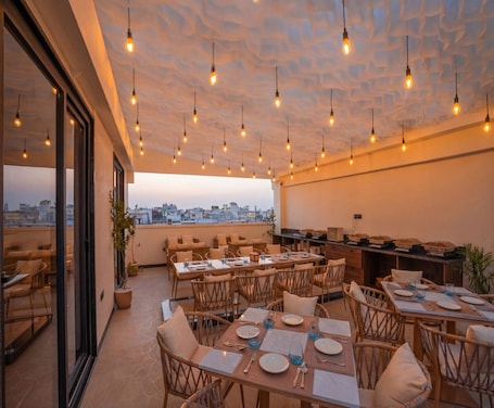 Rooftop terrace. Luxuria Varanasi by Moustache