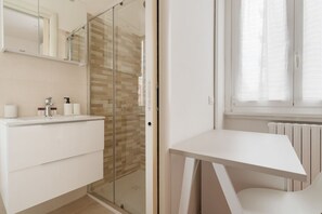 Shower, bidet, towels - GuestHost - A modern and spacious 142 square meters apartment, perfect for five people, located on the second floor of a building with an elevator (NOT accessible to guests with disabilities).The property is just steps from the S. Agostino metro station, (Milan)