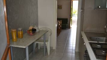 Fridge, stovetop, cookware/dishes/utensils