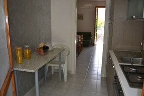 Fridge, stovetop, cookware/dishes/utensils