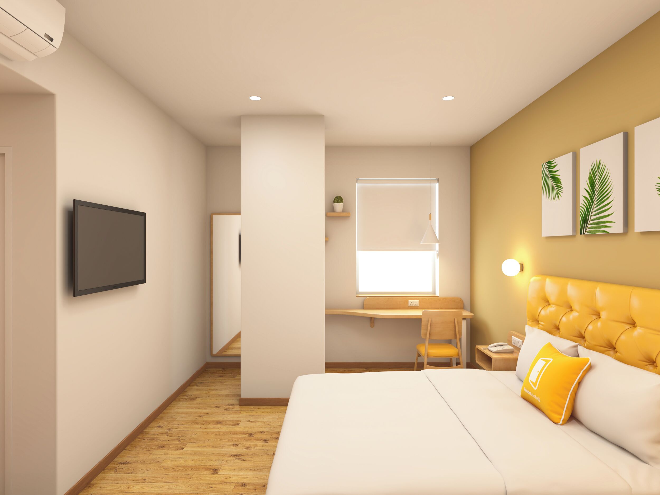 A modern hotel room with a bed, a desk, and a chair.