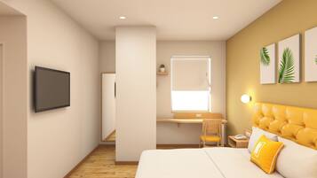 Quarto de hotel moderno com uma cama, uma escrivaninha e uma cadeira.