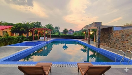 Outdoor pool. ASTORIA CORBETT RESORT