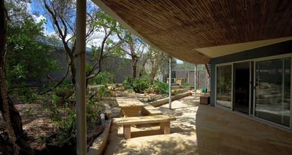 Family holiday house across the surf beach
