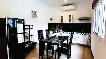 Deluxe Double Room, 2 Bedrooms | Private kitchen | Mini-fridge