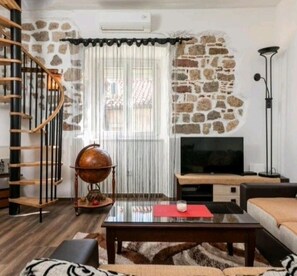 Appartement, 1 chambre, vue sur la ville | Aire de séjour