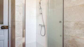 Shower, free toiletries, hair dryer, towels
