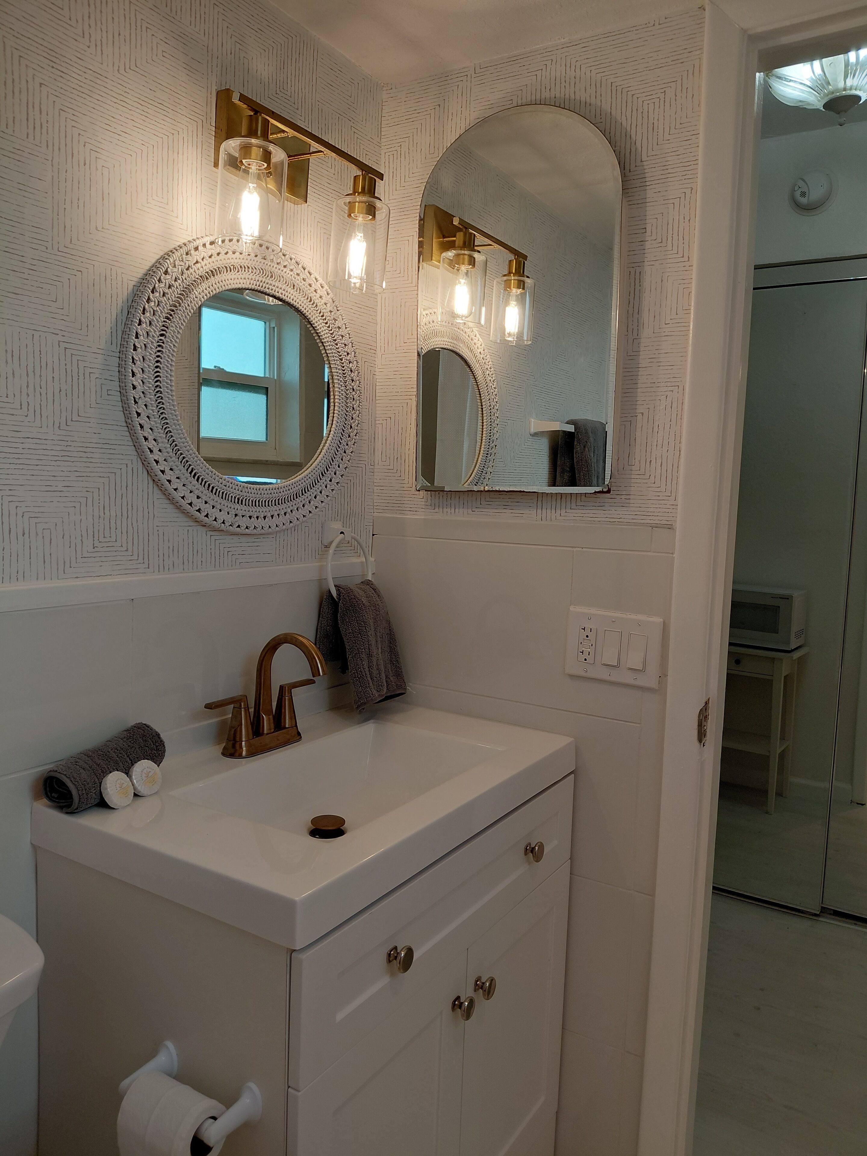 Hair dryer, towels, soap, toilet paper