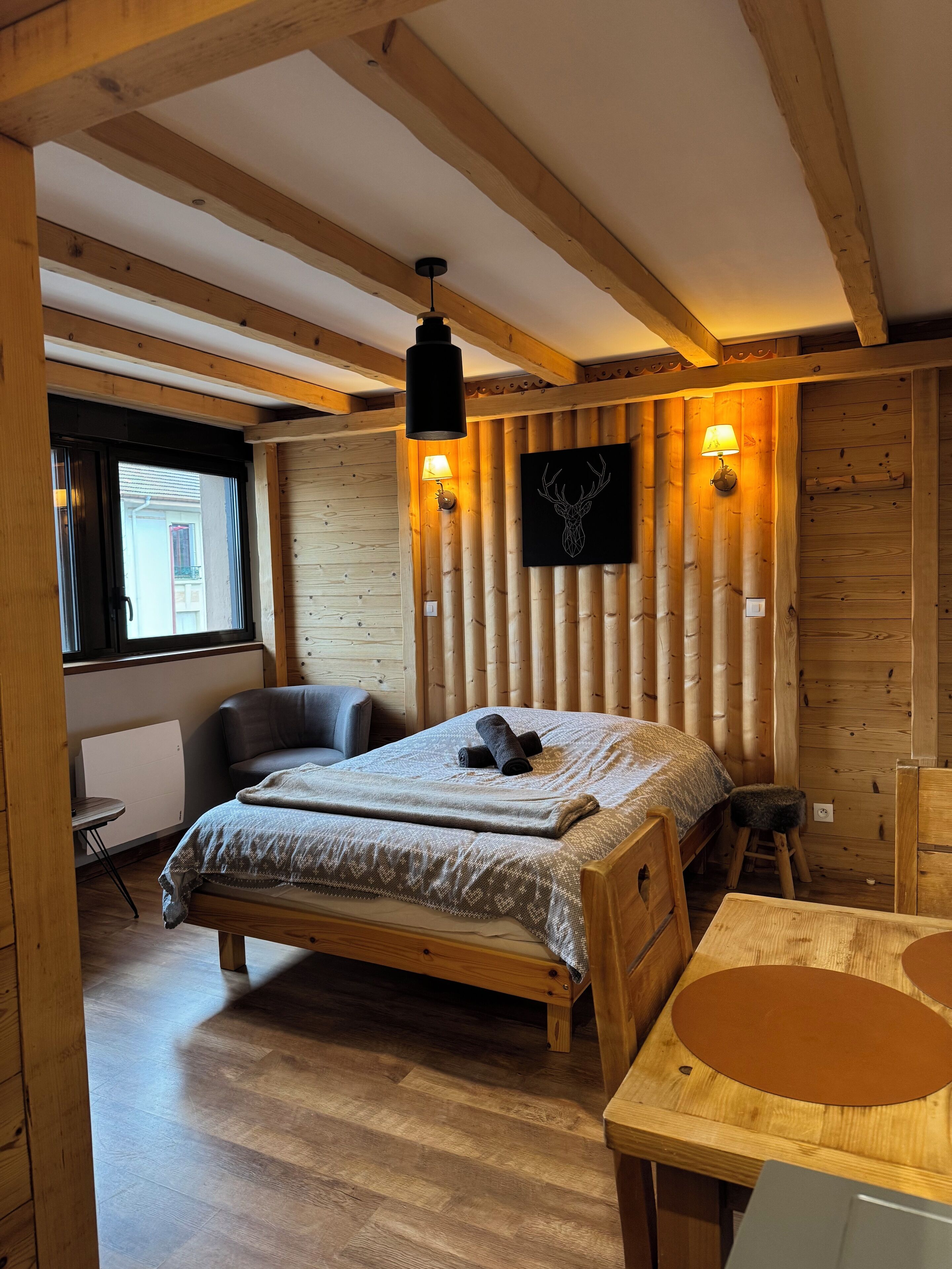 Fer et planche à repasser, draps fournis