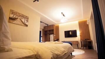Luxury Room, Balcony, City View | In-room safe, desk, laptop workspace, blackout curtains