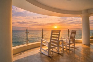 Private beach, white sand, sun loungers, beach umbrellas
