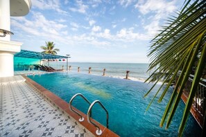 Outdoor pool, open 7:00 AM to 8:00 PM, pool umbrellas, sun loungers - Palado Hotel Mui Ne  (Phan Thiet)