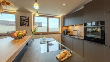 Apartment, Lake View (Feuerwache am See 3) | Private kitchen | Toaster, high chair, blender