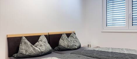 2 habitaciones, wifi gratis y ropa de cama