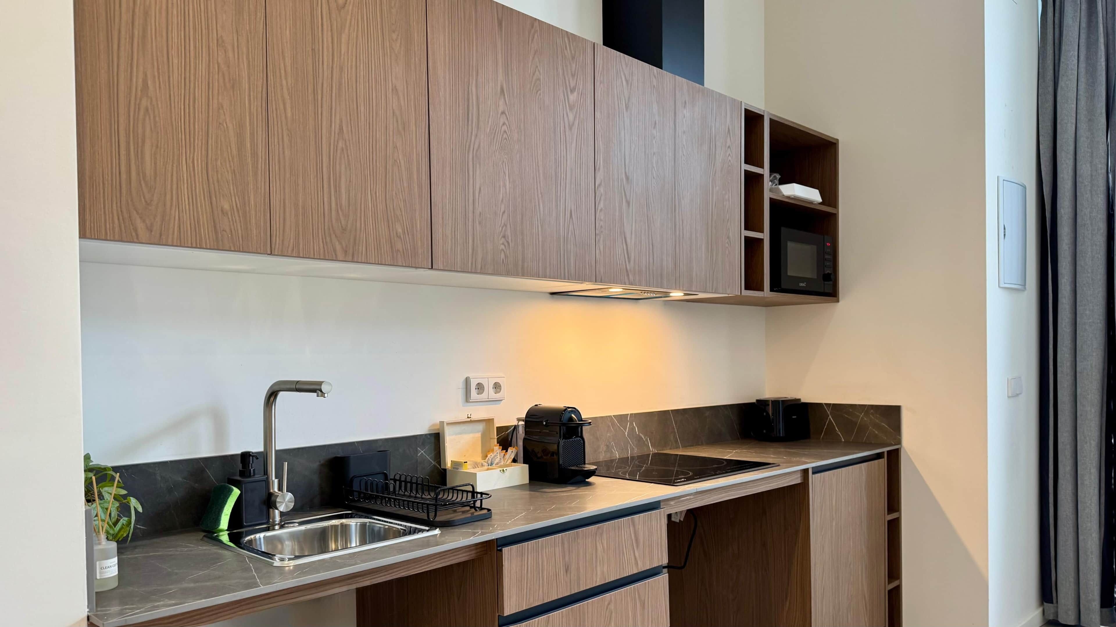 Fridge, microwave, toaster, cookware/dishes/utensils