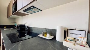 Fridge, microwave, toaster, cookware/dishes/utensils