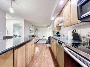 Fridge, microwave, oven, stovetop - RivetStays | The Icon Premium Suite – 1 Bedroom Condo (Toronto)