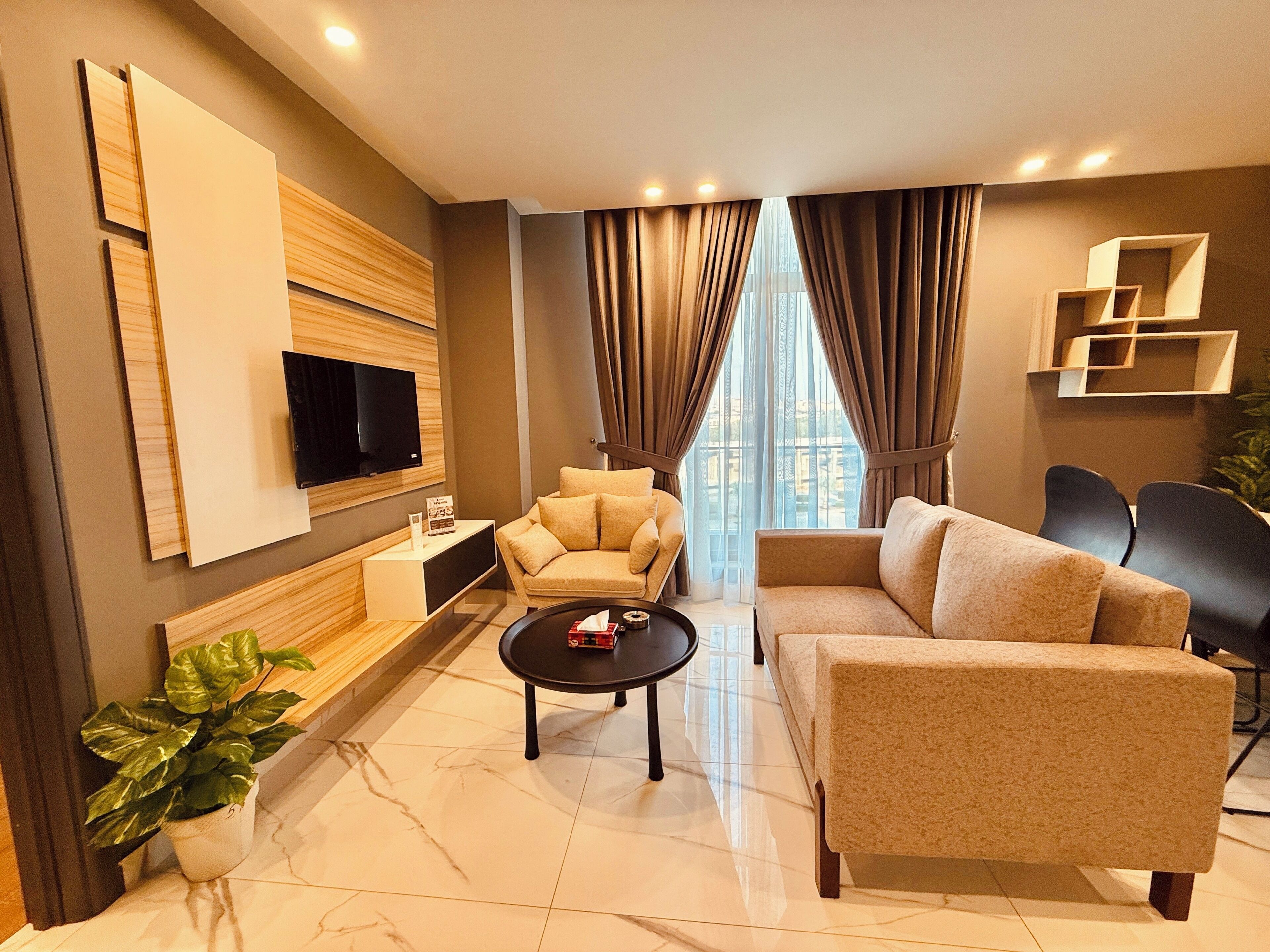 Deluxe Apartment, City View | Living area | 55-inch Smart TV with digital channels, Netflix, Hulu