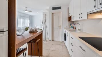 Fridge, microwave, stovetop, coffee/tea maker